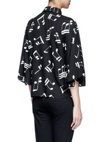 Back View -Click To Enlarge Musical note print bell sleeve shirt