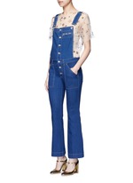 Figure View -Click To Enlarge Embellished metallic star tulle top