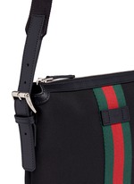 Detail View -Click To Enlarge Stripe trim crossbody messenger bag