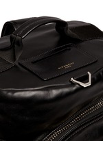 Detail View -Click To Enlarge Star print leather duffle backpack
