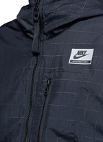 Detail View -Click To Enlarge 'Nike International Windrunner' foldable aerial print jacket