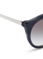Detail View -Click To Enlarge Tortoiseshell effect interior acetate cat eye sunglasses