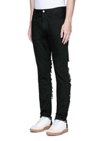 Front View -Click To Enlarge Regular fit ladder ripped jeans
