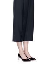 Figure View -Click To Enlarge Enamel plaque patent leather pumps