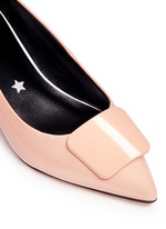 Detail View -Click To Enlarge Enamel plaque patent leather pumps
