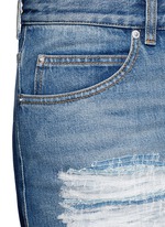 Detail View -Click To Enlarge Distressed patchwork straight leg jeans