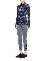 Figure View -Click To Enlarge Camouflage print zip front top