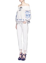 Figure View -Click To Enlarge Floral embroidery smocked off-shoulder top