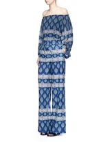 Figure View -Click To Enlarge Temple print off-shoulder chiffon top