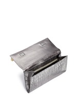 Detail View -Click To Enlarge Embellished metallic crocodile leather clutch