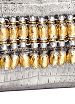 Detail View -Click To Enlarge Embellished metallic crocodile leather clutch
