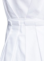 Detail View -Click To Enlarge Peplum back sleeveless shirt