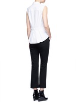 Figure View -Click To Enlarge Peplum back sleeveless shirt