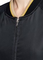 Detail View -Click To Enlarge Flocked animal print panelled bomber jacket
