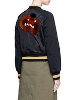 Back View -Click To Enlarge Flocked animal print panelled bomber jacket