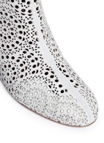 Detail View -Click To Enlarge Geometric lasercut perforated suede ankle boots