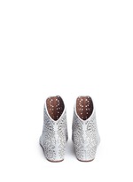 Back View -Click To Enlarge Geometric lasercut perforated suede ankle boots