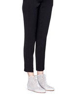Figure View -Click To Enlarge Geometric lasercut perforated suede ankle boots