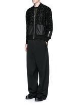 Figure View -Click To Enlarge Distressed open knit bomber jacket