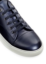 Detail View -Click To Enlarge Patent leather sneakers