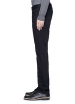 Detail View -Click To Enlarge Slim fit solid cotton denim jeans