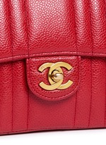 Detail View -Click To Enlarge Vintage Chanel quilted caviar leather mini flap bag