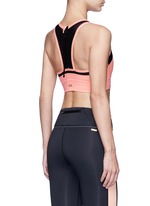 Back View -Click To Enlarge 'Zip it up' mesh panel sports bra