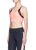 Front View -Click To Enlarge 'Zip it up' mesh panel sports bra