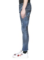 Detail View -Click To Enlarge 'Sexy Twist' rip and repair slim fit jeans