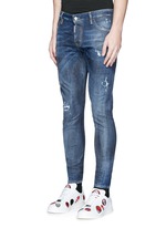 Front View -Click To Enlarge 'Sexy Twist' rip and repair slim fit jeans