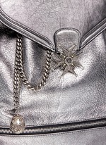 Detail View -Click To Enlarge Small charm chain metallic pebbled leather backpack