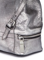 Detail View -Click To Enlarge Small charm chain metallic pebbled leather backpack