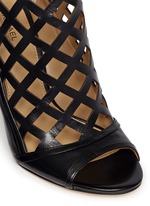 Detail View -Click To Enlarge 'Yvonne' cutout leather open toe caged booties