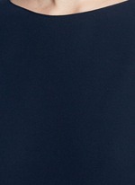 Detail View -Click To Enlarge Rib cuff lasercut crepe blouse