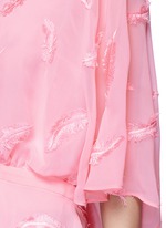 Detail View -Click To Enlarge Feather embroidery batwing cape top
