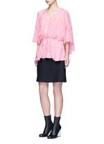 Figure View -Click To Enlarge Feather embroidery batwing cape top