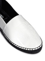 Detail View -Click To Enlarge Embossed tiger head patent espadrille slip-ons