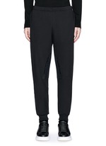 Main View -Click To Enlarge Perforated leather patch jogging pants