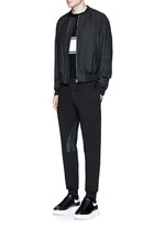 Figure View -Click To Enlarge Perforated leather patch jogging pants