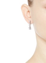Figure View -Click To Enlarge Graduating oval cut cubic zirconia drop earrings