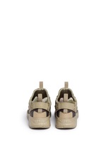 Back View -Click To Enlarge 'Nike Air Huarache Utility' camouflage print sneakers