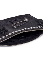 Detail View -Click To Enlarge Pear star chain embellished leather fringe clutch