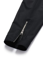 Detail View -Click To Enlarge Zip cuff bistretch gabardine cropped pants