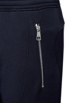 Detail View -Click To Enlarge Faux leather panel bonded jersey biker jogging pants