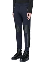 Front View -Click To Enlarge Faux leather panel bonded jersey biker jogging pants