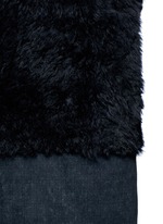 Detail View -Click To Enlarge Reversible mesh embossed Alpine lambskin shearling gilet