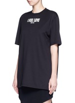 Front View -Click To Enlarge 'I Feel Love' slogan T-shirt