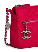 Detail View -Click To Enlarge Vintage Chanel embossed quilted cotton zip bag
