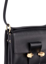 Detail View -Click To Enlarge Twin skull leather satchel