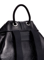 Detail View -Click To Enlarge Pixel skull stud leather backpack